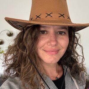 Brown Western Cowboy Hat with Black Decorative Stitching and Chin Strap